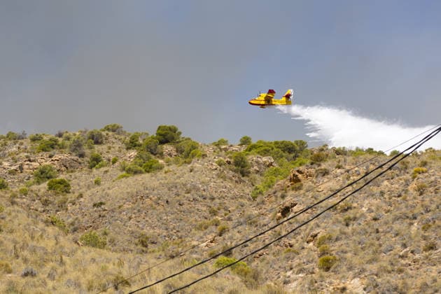 Forest fire kills at least 12 in southern Spain ALMERIA, SPAIN - JULY 10: A firefighting aircraft drops water while responding to a fire as evacuation and forest fire extinguishing operations are ongoing in the Los Gallardos district of Almeria, Spain on July 10, 2026. At least 12 people were killed in a forest fire that broke out Thursday in Los Gallardos municipality in Almeria province in Spain’s southern Andalusia region, broadcaster RTVE reported. According to Andalusia’s emergency services, the victims were found in a hamlet of the neighboring municipality of Bedar, with some discovered inside vehicles engulfed by the flames. Chema Artero Anadolu Almeria Spain. Editorial use only. Please get in touch for any other usage.  Copyright: x2026xAnadoluxChemaxArterox