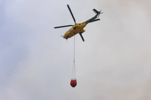 Forest fire kills at least 12 in southern Spain ALMERIA, SPAIN - JULY 10: A firefighting helicopter is carrying water to respond to the fire as evacuation and forest fire extinguishing operations are ongoing in the Los Gallardos district of Almeria, Spain on July 10, 2026. At least 12 people were killed in a forest fire that broke out Thursday in Los Gallardos municipality in Almeria province in Spain’s southern Andalusia region, broadcaster RTVE reported. According to Andalusia’s emergency services, the victims were found in a hamlet of the neighboring municipality of Bedar, with some discovered inside vehicles engulfed by the flames. Chema Artero Anadolu Almeria Spain. Editorial use only. Please get in touch for any other usage.  Copyright: x2026xAnadoluxChemaxArterox