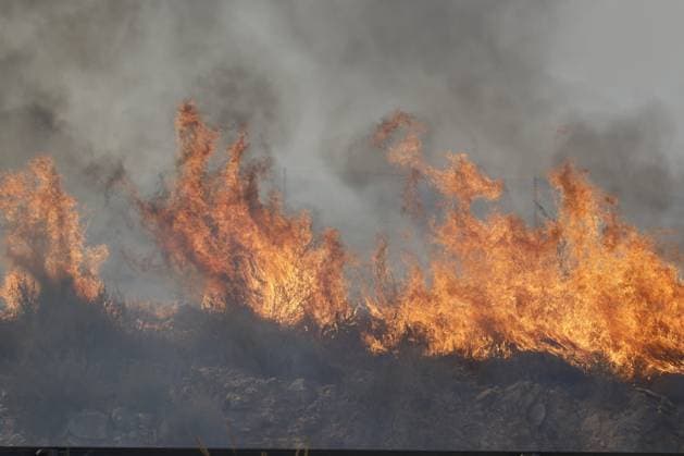 Forest fire kills at least 12 in southern Spain ALMERIA, SPAIN - JULY 10: Large walls of fire and thick grey smoke tear through the landscape during a massive wildfire while evacuation and firefighting efforts continue in the Los Gallardos district of Almeria, Spain on July 10, 2026. At least 12 people were killed in a forest fire that broke out Thursday in Los Gallardos municipality in Almeria province in Spain’s southern Andalusia region, broadcaster RTVE reported. According to Andalusia’s emergency services, the victims were found in a hamlet of the neighboring municipality of Bedar, with some discovered inside vehicles engulfed by the flames. Pablo Miranzo Anadolu Almeria Spain. Editorial use only. Please get in touch for any other us  Copyright: x2026xAnadoluxPabloxMiranzox