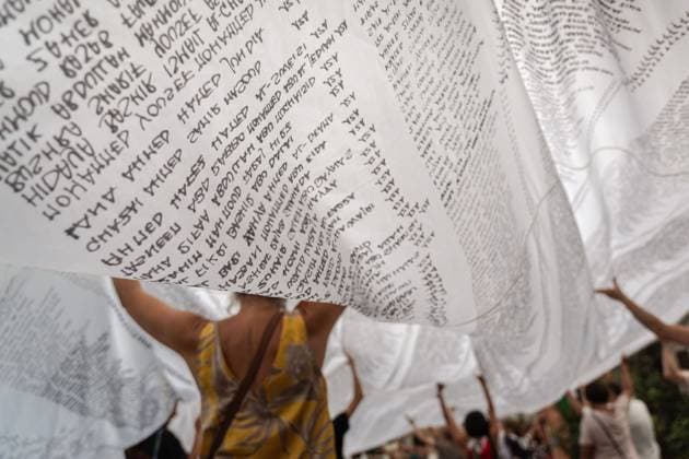 ITALY-GAZA PROTEST CESENA, ITALY, JULY 10, 2026 Participants march beneath a giant white shroud covered with the names of 18,457 Palestinian children killed in Gaza since October 2023 during the Shroud for Gaza demonstration in Cesena, northern Italy. The memorial installation is part of a travelling national initiative that has crossed several Italian cities to honour the victims of the war and draw attention to the humanitarian consequences of the conflict. (Silvia Casadei JNA Press) Cesena Italy Copyright: x xSilviaxCasadeix xJNAxPressx