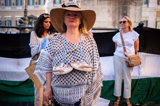 July 10, 2026, Rome, Rm, Italy: Activists from the group Health Workers for Gaza are holding a rally in front of Montecitorio, the Chamber of Deputies, to demand the release of Dr. Hussam Abu Safiya and all other Palestinian prisoners. Participant shows children s shoes stained with red paint to remember the high number of children victims of the conflict. Rome Italy - ZUMAg256 20260710_znp_g256_002 Copyright: xMarcoxDixGianvitox
