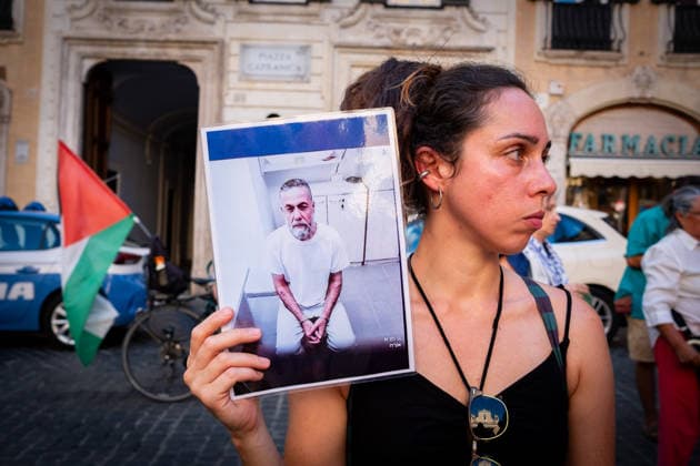 July 10, 2026, Rome, Rm, Italy: Activists from the group Health Workers for Gaza are holding a rally in front of Montecitorio, the Chamber of Deputies, to demand the release of Dr. Hussam Abu Safiya and all other Palestinian prisoners. A participant shows the picture of Dr. Abu Safiya. Rome Italy - ZUMAg256 20260710_znp_g256_010 Copyright: xMarcoxDixGianvitox