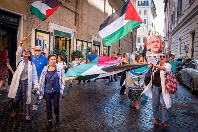 July 10, 2026, Rome, Rm, Italy: Activists from the group Health Workers for Gaza are holding a rally in front of Montecitorio, the Chamber of Deputies, to demand the release of Dr. Hussam Abu Safiya and all other Palestinian prisoners. Participants arrive in front of Montecitorio showing an image of Dr. Abu Safiya. Rome Italy - ZUMAg256 20260710_znp_g256_012 Copyright: xMarcoxDixGianvitox