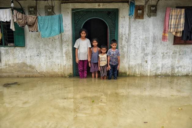 July 10, 2026, Banshkhali, Bangladesh: BANSHKHALI, CHATTOGRAM, BANGLADESH Ã¢â‚¬ JULY 10, 2026: Residents wade through floodwaters and evacuate children and belongings after days of heavy monsoon rainfall, runoff from surrounding hills and high tides caused severe flooding in Banshkhali Upazila, Chattogram. Hundreds of homes, roads and agricultural land have been inundated, leaving many families stranded and increasing concerns over access to shelter, clean water and essential services. Authorities and local volunteers continue to monitor the situation as affected residents wait for floodwaters to recede. Photos by JNA PRESS. Banshkhali Bangladesh  - ZUMAq101 20260710_zna_q101_060 Copyright: xIstiyakxAhamedxSrabonx