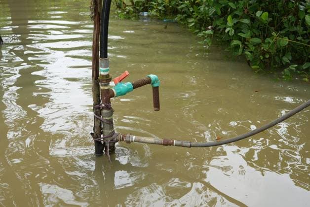 July 10, 2026, Banshkhali, Bangladesh: BANSHKHALI, CHATTOGRAM, BANGLADESH Ã¢â‚¬ JULY 10, 2026: Residents wade through floodwaters and evacuate children and belongings after days of heavy monsoon rainfall, runoff from surrounding hills and high tides caused severe flooding in Banshkhali Upazila, Chattogram. Hundreds of homes, roads and agricultural land have been inundated, leaving many families stranded and increasing concerns over access to shelter, clean water and essential services. Authorities and local volunteers continue to monitor the situation as affected residents wait for floodwaters to recede. Photos by JNA PRESS. Banshkhali Bangladesh  - ZUMAq101 20260710_zna_q101_075 Copyright: xIstiyakxAhamedxSrabonx
