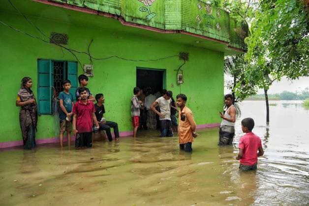 July 10, 2026, Banshkhali, Bangladesh: BANSHKHALI, CHATTOGRAM, BANGLADESH Ã¢â‚¬ JULY 10, 2026: Residents wade through floodwaters and evacuate children and belongings after days of heavy monsoon rainfall, runoff from surrounding hills and high tides caused severe flooding in Banshkhali Upazila, Chattogram. Hundreds of homes, roads and agricultural land have been inundated, leaving many families stranded and increasing concerns over access to shelter, clean water and essential services. Authorities and local volunteers continue to monitor the situation as affected residents wait for floodwaters to recede. Photos by JNA PRESS. Banshkhali Bangladesh  - ZUMAq101 20260710_zna_q101_080 Copyright: xIstiyakxAhamedxSrabonx