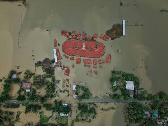 July 10, 2026, Banshkhali, Bangladesh: BANSHKHALI, CHATTOGRAM, BANGLADESH Ã¢â‚¬ JULY 10, 2026: Residents wade through floodwaters and evacuate children and belongings after days of heavy monsoon rainfall, runoff from surrounding hills and high tides caused severe flooding in Banshkhali Upazila, Chattogram. Hundreds of homes, roads and agricultural land have been inundated, leaving many families stranded and increasing concerns over access to shelter, clean water and essential services. Authorities and local volunteers continue to monitor the situation as affected residents wait for floodwaters to recede. Photos by JNA PRESS. Banshkhali Bangladesh  - ZUMAq101 20260710_zna_q101_101 Copyright: xIstiyakxAhamedxSrabonx