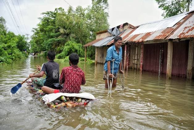 July 10, 2026, Banshkhali, Bangladesh: BANSHKHALI, CHATTOGRAM, BANGLADESH Ã¢â‚¬ JULY 10, 2026: Residents wade through floodwaters and evacuate children and belongings after days of heavy monsoon rainfall, runoff from surrounding hills and high tides caused severe flooding in Banshkhali Upazila, Chattogram. Hundreds of homes, roads and agricultural land have been inundated, leaving many families stranded and increasing concerns over access to shelter, clean water and essential services. Authorities and local volunteers continue to monitor the situation as affected residents wait for floodwaters to recede. Photos by JNA PRESS. Banshkhali Bangladesh  - ZUMAq101 20260710_zna_q101_103 Copyright: xIstiyakxAhamedxSrabonx