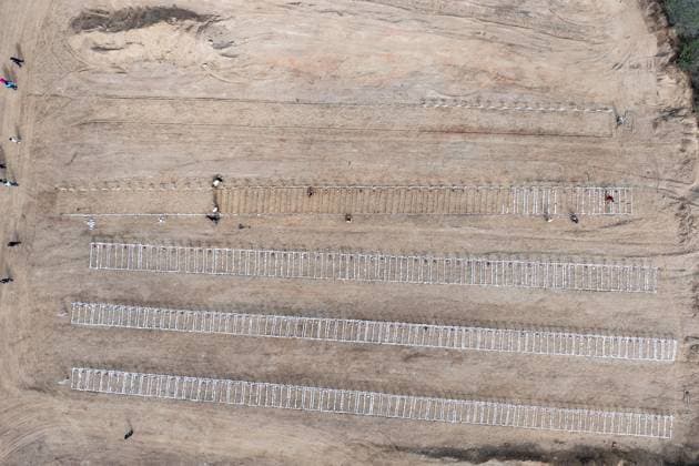Emergency cemetery opens in Venezuela after deadly earthquakes LA GUAIRA, VENEZUELA - JULY 10: An aerial view of the mass grave at the La Esperanza Cemetery located along the highway connecting Catia La Mar and Carayaca, as it was opened under emergency measures following the June 24 earthquakes to bury the bodies of hundreds of people whose relatives could not be reached, in La Guaira, Venezuela on July 10, 2026. Alongside identified victims, hundreds of unidentified bodies were also laid to rest at the cemetery. Cem Tekkesinoglu Anadolu La Guaira Venezuela. Editorial use only. Please get in touch for any other usage.  Copyright: x2026xAnadoluxCemxTekkesinoglux