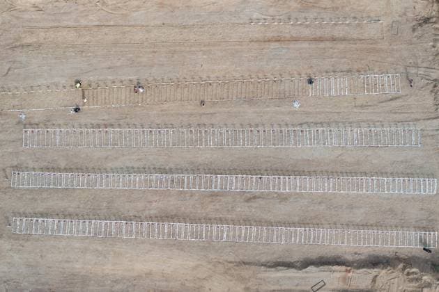 Emergency cemetery opens in Venezuela after deadly earthquakes LA GUAIRA, VENEZUELA - JULY 10: An aerial view of the mass grave at the La Esperanza Cemetery located along the highway connecting Catia La Mar and Carayaca, as it was opened under emergency measures following the June 24 earthquakes to bury the bodies of hundreds of people whose relatives could not be reached, in La Guaira, Venezuela on July 10, 2026. Alongside identified victims, hundreds of unidentified bodies were also laid to rest at the cemetery. Cem Tekkesinoglu Anadolu La Guaira Venezuela. Editorial use only. Please get in touch for any other usage.  Copyright: x2026xAnadoluxCemxTekkesinoglux