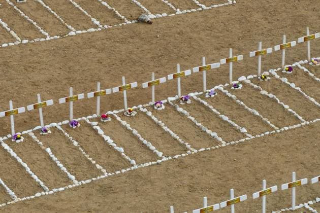 Emergency cemetery opens in Venezuela after deadly earthquakes LA GUAIRA, VENEZUELA - JULY 10: An aerial view of the mass grave at the La Esperanza Cemetery located along the highway connecting Catia La Mar and Carayaca, as it was opened under emergency measures following the June 24 earthquakes to bury the bodies of hundreds of people whose relatives could not be reached, in La Guaira, Venezuela on July 10, 2026. Alongside identified victims, hundreds of unidentified bodies were also laid to rest at the cemetery. Cem Tekkesinoglu Anadolu La Guaira Venezuela. Editorial use only. Please get in touch for any other usage.  Copyright: x2026xAnadoluxCemxTekkesinoglux