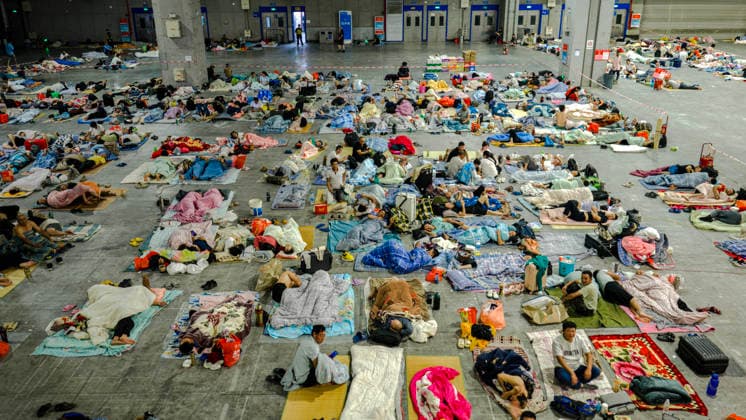 WENZHOU, CHINA - JULY 10: Over 1,100 construction workers are relocated to a resettlement site at Wenzhou International Convention and Exhibition Center as Typhoon Bavi approaches on July 10, 2026 in Wenzhou, Zhejiang Province of China. China s State Flood Control and Drought Relief Headquarters on July 10 raised its emergency response for flood control and typhoon prevention in Zhejiang and Fujian provinces from Level III to Level II.  Copyright: xVCGx 111653562170