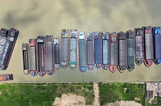 Typhoon Bavi Transport ships orderly dock at the Huai an section of the Subei Canal to defend against the upcoming typhoon Bavi in Huai an City, Jiangsu Province, China on July 11, 2026. Huai an Jiangsu China  Copyright: xCFOTOx i1783779502477