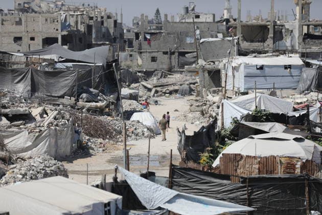 Displaced Palestinians endure harsh living conditions in eastern Gaza City Displaced Palestinians struggle to continue their daily lives inside worn-out tents erected near buildings destroyed by the war in the al-Zarqa area, east of Gaza City, on July 11, 2026. The scene coincides with World Population Day as displaced families continue to face shortages of water and food, deteriorating sanitation and healthcare services, and the widespread collapse of essential infrastructure amid the ongoing impact of the war. Photo by Bilal Osama apaimages Gaza city Gaza Strip Palestinian Territory 110726_Gaza_BO_00(32) Copyright: xapaimagesxBilalxOsamax xapaimagesx