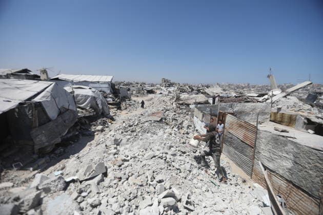 Displaced Palestinians endure harsh living conditions in eastern Gaza City Displaced Palestinians struggle to continue their daily lives inside worn-out tents erected near buildings destroyed by the war in the al-Zarqa area, east of Gaza City, on July 11, 2026. The scene coincides with World Population Day as displaced families continue to face shortages of water and food, deteriorating sanitation and healthcare services, and the widespread collapse of essential infrastructure amid the ongoing impact of the war. Photo by Bilal Osama apaimages Gaza city Gaza Strip Palestinian Territory 110726_Gaza_BO_00(76) Copyright: xapaimagesxBilalxOsamax xapaimagesx