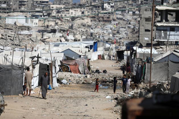 Displaced Palestinians endure harsh living conditions in eastern Gaza City Displaced Palestinians struggle to continue their daily lives inside worn-out tents erected near buildings destroyed by the war in the al-Zarqa area, east of Gaza City, on July 11, 2026. The scene coincides with World Population Day as displaced families continue to face shortages of water and food, deteriorating sanitation and healthcare services, and the widespread collapse of essential infrastructure amid the ongoing impact of the war. Photo by Bilal Osama apaimages Gaza city Gaza Strip Palestinian Territory 110726_Gaza_BO_00(4) Copyright: xapaimagesxBilalxOsamax xapaimagesx