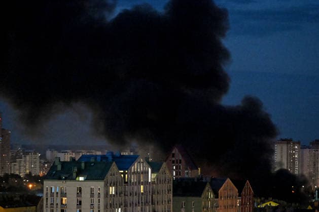 Black smoke from a Russian attack rises above apartment blocks in Kyiv, Ukraine, July 11, 2026. On Saturday night, July 11, the Russian army launched a ballistic missile strike on Kyiv for the third time in a week. At least 11 people were injured, including an 11-year-old boy. (Photo by Yevhen Kotenko Ukrinform) Smoke over Kyiv after Russian attack  Copyright: xYevhenxKotenkox