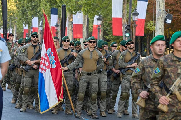 Rehearsal for July 14th 2026 Military Parade on the Champs-Elysees - Paris Rehearsal for July 14th 2026 Military Parade on the Champs-Elysees, in Paris, France, on July 11, 2026. Thirty-six foreign nations and over 6,000 soldiers will be on the Champs-elysees for the 2026 edition of the July 14th parade. Some 500 soldiers from member countries of the Volunteer Coalition and twenty-five Ukrainian soldiers will lead the traditional July 14 military parade on the Champs-Élysees, in front of about 30 heads of state and government. Photo by Jean Pierre Nguyen Van Hai Barbier ABACAPRESS.COM Paris France  Copyright: xNguyenxVanxHai-BarbierxJeanxPierre ABACAx