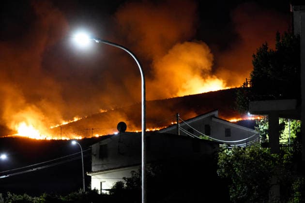 Firefighters battle wildfires in western and southern Sicily SICILY, ITALY - JULY 11: Flames consume maquis areas near residential areas as wildfires spread across the western and southern parts of Sicily, Italy on July 11, 2026. Following initial overnight responses by ground crews with water tenders, helicopters and firefighting aircraft launched aerial operations at sunrise to bring the wind-driven fires under control. Alberto Lo Bianco Anadolu Sicily Italy. Editorial use only. Please get in touch for any other usage.  Copyright: x2026xAnadoluxAlbertoxLoxBiancox