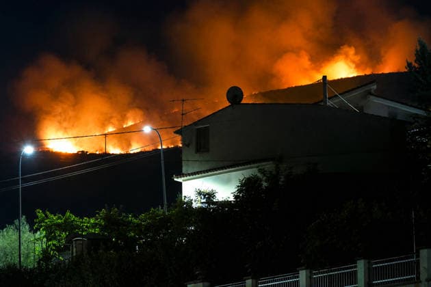 Firefighters battle wildfires in western and southern Sicily SICILY, ITALY - JULY 11: Flames consume maquis areas near residential areas as wildfires spread across the western and southern parts of Sicily, Italy on July 11, 2026. Following initial overnight responses by ground crews with water tenders, helicopters and firefighting aircraft launched aerial operations at sunrise to bring the wind-driven fires under control. Alberto Lo Bianco Anadolu Sicily Italy. Editorial use only. Please get in touch for any other usage.  Copyright: x2026xAnadoluxAlbertoxLoxBiancox