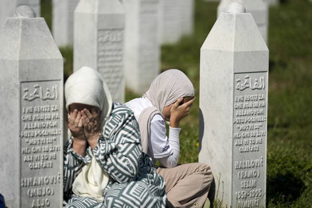 Thousands gather in Srebrenica to mark 31st anniversary of genocide as 10 more victims laid to rest POTOCARI, BOSNIA AND HERZEGOVINA - JULY 11: Relatives of victims of the 1995 Srebrenica genocide pray at the graves of their loved ones at the Potocari Memorial Cemetery in Potocari, Bosnia and Herzegovina, on July 11, 2026. Thousands of mourners, survivors, foreign dignitaries and religious leaders gathered Saturday at the Srebrenica-Potocari Memorial Center to mark the 31st anniversary of the Srebrenica genocide as the remains of 10 newly identified victims were laid to rest. The collective funeral, held every July 11, remains one of Bosnia and Herzegovina’s most solemn commemorations, as families continue burying loved ones whose remains a  Copyright: x2026xAnadoluxSamirxJordamovicx