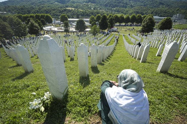 Thousands gather in Srebrenica to mark 31st anniversary of genocide as 10 more victims laid to rest POTOCARI, BOSNIA AND HERZEGOVINA - JULY 11: Relatives of victims of the 1995 Srebrenica genocide pray at the graves of their loved ones at the Potocari Memorial Cemetery in Potocari, Bosnia and Herzegovina, on July 11, 2026. Thousands of mourners, survivors, foreign dignitaries and religious leaders gathered Saturday at the Srebrenica-Potocari Memorial Center to mark the 31st anniversary of the Srebrenica genocide as the remains of 10 newly identified victims were laid to rest. The collective funeral, held every July 11, remains one of Bosnia and Herzegovina’s most solemn commemorations, as families continue burying loved ones whose remains a  Copyright: x2026xAnadoluxSamirxJordamovicx