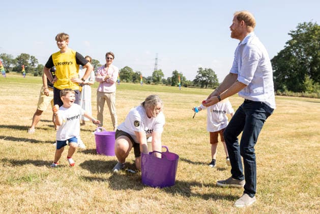 Prince Harry at Scotty s Summer Festival Prince Harry having a water fight with 3 yr old River Prince Harry taking part in Scotty s Summer Festival at Maxstoke Castle, Birmingham . Scotty s is a military bereavement charity that provides relief from the effects of grief for bereaved military children and young people who have experienced the death of a parent who served in the British Forces. 11 July 2026, Credit:Heathcliff O Malley for the Telegraph PA ROTA - B68 Avalon  Copyright: xHeathcliffxO MalleyxforxthexTelegraphx xPAxROTAx-xB68x xAvalonx 1115961872