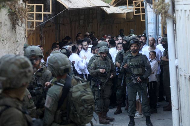 Israeli soldiers deploy during settler incursion in Hebron Israeli soldiers deploy in the Old City of Hebron, in the West Bank, to secure an incursion by Israeli settlers into the area, on July 11, 2026. Israeli forces imposed restrictions on the movement of Palestinians and shop owners around the Old City during the incursion. Photo by Mamoun Wazwaz apaimages Hebron West Bank Palestinian Territory 110726_Hebron_MW_00(5) Copyright: xapaimagesxMamounxWazwazx xapaimagesx