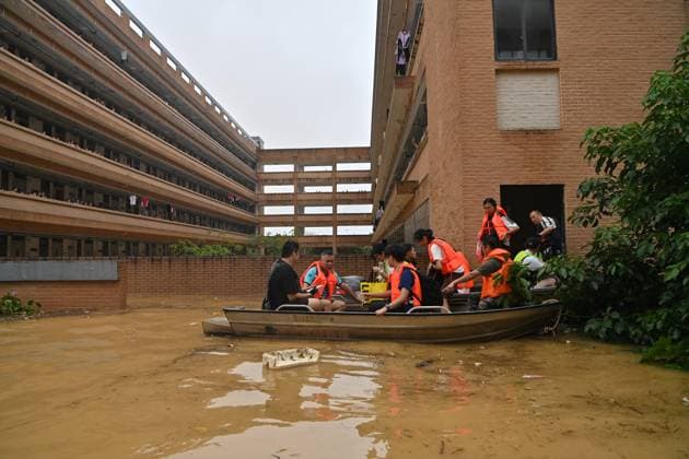 (260711) -- NANNING, July 11, 2026 -- Rescuers evacuate stranded students at Xijiang education park in Guigang, south China s Guangxi Zhuang Autonomous Region, July 8, 2026. Triggered by Typhoon Maysak, the tenth typhoon of the year, heavy downpours battered multiple areas in south China s Guangxi Zhuang Autonomous Region, resulting in a series of disasters. Various response forces have pooled their efforts, carrying out operations including rescue missions in remote mountainous areas, restoration of transport and power infrastructure, and silt clearing operations. ) CHINA-GUANGXI-TYPHOON-FLOOD-RESCUE (CN) ZhouxHua 