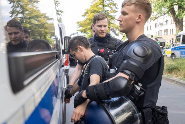Pro-Palestine activists protest outside Rheinmetall weapons factory in Berlin BERLIN, GERMANY - JULY 11: Police officers take an activist into custody during a demonstration outside a Rheinmetall weapons production facility in the Wedding district of Berlin, Germany, on July 11, 2026. Hundreds of anti-war and pro-Palestine protesters gathered to voice their opposition to the defense company s operations, leading to several interventions by the police. Ilkin Eskipehlivan Anadolu Berlin Germany. Editorial use only. Please get in touch for any other usage.  Copyright: x2026xAnadoluxIlkinxEskipehlivanx