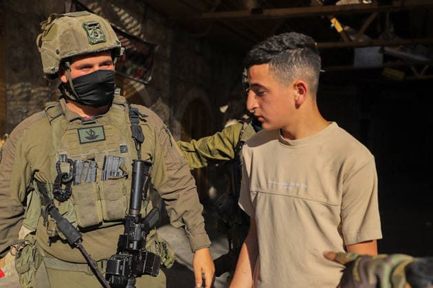 Israeli settlers under army protection raid Old City of Hebron in West Bank HEBRON, WEST BANK, PALESTINE - JULY 11: Israeli forces block entry and exit points with iron barricades to restrict the movement of Palestinians as Israeli settlers, escorted by Israeli forces, raid the Old City area of Hebron in the southern West Bank, Palestine on July 11, 2026. Amer Shallodi Anadolu Hebron West Bank. Editorial use only. Please get in touch for any other usage.  Copyright: x2026xAnadoluxAmerxShallodix