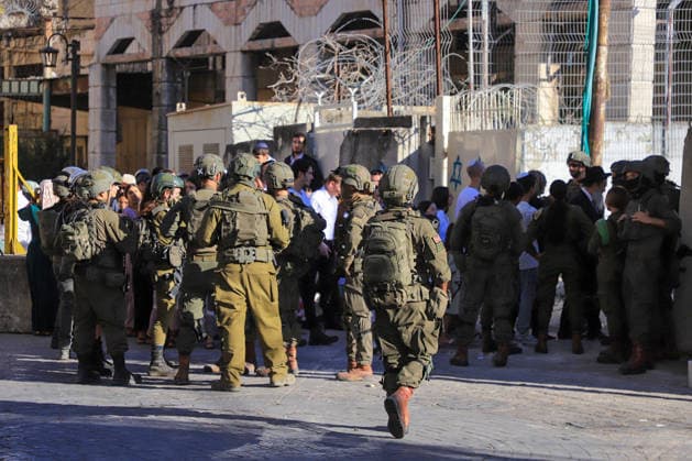 Israeli settlers under army protection raid Old City of Hebron in West Bank HEBRON, WEST BANK, PALESTINE - JULY 11: Israeli forces block entry and exit points with iron barricades to restrict the movement of Palestinians as Israeli settlers, escorted by Israeli forces, raid the Old City area of Hebron in the southern West Bank, Palestine on July 11, 2026. Amer Shallodi Anadolu Hebron West Bank. Editorial use only. Please get in touch for any other usage.  Copyright: x2026xAnadoluxAmerxShallodix