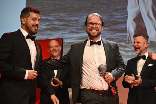 The final day of the 60th Karlovy Vary International Film Festival, on July 11, 2026. Danish director Mads Mengel with the award for best director for the film The Guest. (CTKxPhoto KaterinaxSulova) CTKPhotoP2026071104559  CTKPhotoP2026071104559