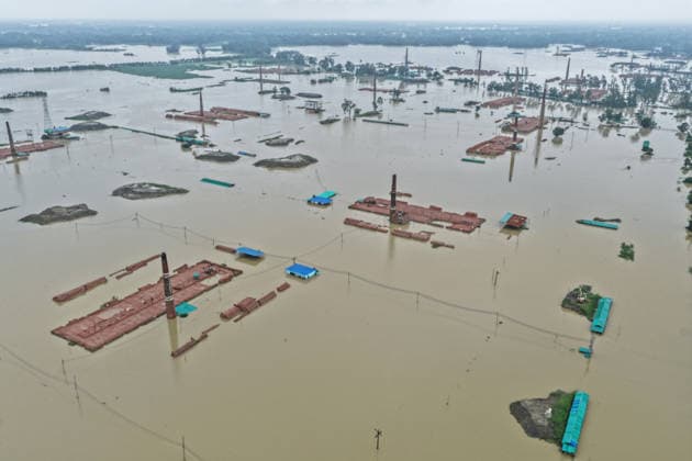July 11, 2026, Satkania, Chattogram, Bangladesh: July 11, 2026, Satkania, Chattogram, Bangladesh: An aerial view shows brick kilns and surrounding land submerged by widespread floodwaters following days of relentless rainfall. Severe flooding has inundated homes, cropland, roads and businesses across Chattogram Division, affecting more than 928,000 people and leaving thousands stranded. Satkania Bangladesh - ZUMAh178 20260711_zip_h178_053 Copyright: xMuhammadxAmdadxHossainx