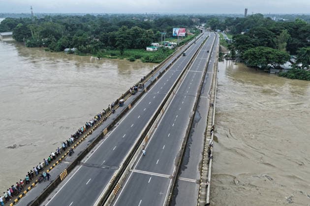 July 11, 2026, Satkania, Chattogram, Bangladesh: July 11, 2026 Ã¢â‚¬ Satkania, Chattogram, Bangladesh: An aerial view shows the swollen Sangu River flowing beneath bridges in Satkania after days of relentless monsoon rainfall. Severe floods across Chattogram Division have killed at least 39 people and affected more than 928,000, inundating communities, roads and cropland. Satkania Bangladesh - ZUMAh178 20260711_zip_h178_086 Copyright: xMuhammadxAmdadxHossainx