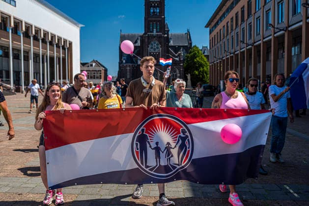 July 11, 2026, Schiedam, South Holland, Netherlands: 11 July 2026. Anti-asylum seeker center demonstrators begin to march. In Schiedam, the Netherlands, a pro-asylum seeker demonstration promoted by Extinction Rebellion countered a demonstration called the Vrouwenmars tegen het AZC (Women s March Against the AZC) promoted by anti-asylum seeker center groups. Both events took place in the center of Schiedam. Schiedam Netherlands - ZUMAp202 20260711_zip_p202_017 Copyright: xJamesxPetermeierx