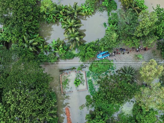 July 10, 2026, Banshkhali, Chattogram, Bangladesh: July 10, 2026 Ã¢â‚¬ Banshkhali, Chattogram, Bangladesh: Villagers wade through floodwaters while transporting the dead body of a boy by boat for burial. Severe flooding has inundated roads and communities across Chattogram Division, killing at least 39 people and affecting more than 928,000. Banshkhali Bangladesh - ZUMAh178 20260710_zip_h178_090 Copyright: xMuhammadxAmdadxHossainx