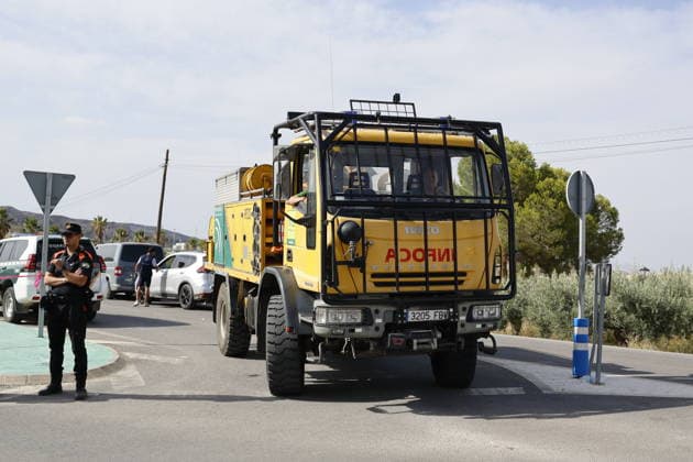 Deadly wildfire scorches Almeria province in Spain LOS GALLARDOS, SPAIN - JULY 11: Emergency operations continue near Bedar as security forces restrict access to the wildfire-affected area and direct local residents away from danger in Almeria province, Spain, on July 11, 2026. Firefighters, supported by helicopters and other emergency teams, carry out containment, surveillance and recovery operations across the burned landscape, while roads leading toward the fire zone remain under security control. Improved weather conditions helped crews gain the upper hand over the blaze and intensify efforts to prevent it from spreading further. The wildfire killed at least 12 people and burned about 6,600 hectares of forest, farmland and surrounding r  Copyright: x2026xAnadoluxPabloxMiranzox