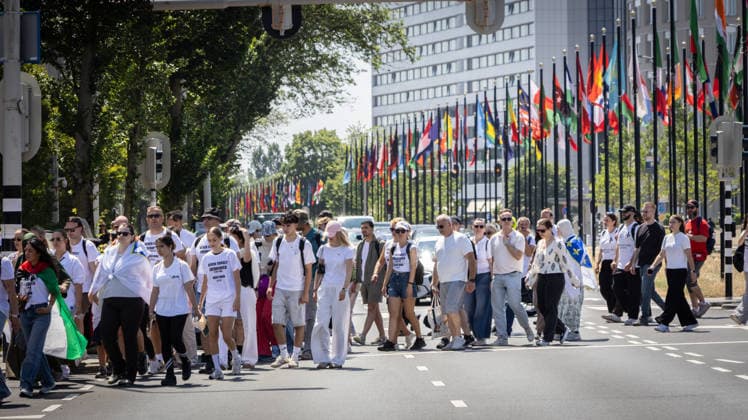 Srebrenica genocide victims commemorated on 31st anniversary in The Hague THE HAGUE, NETHERLANDS - JULY 11: Hundreds of people gather for an 11-kilometer symbolic Peace March held in memory of the 1995 Srebrenica genocide victims on its 31st anniversary, in The Hague, Netherlands, on July 11, 2026. Participants rest outside the former International Criminal Tribunal for the former Yugoslavia (ICTY) building during a commemoration event. Abdullah Asiran Anadolu The Hague Netherlands. Editorial use only. Please get in touch for any other usage.  Copyright: x2026xAnadoluxAbdullahxAsiranx
