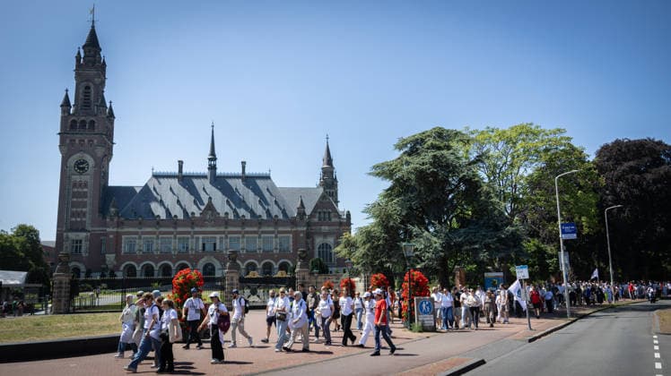 Srebrenica genocide victims commemorated on 31st anniversary in The Hague THE HAGUE, NETHERLANDS - JULY 11: Hundreds of people gather for an 11-kilometer symbolic Peace March held in memory of the 1995 Srebrenica genocide victims on its 31st anniversary, in The Hague, Netherlands, on July 11, 2026. Participants rest outside the former International Criminal Tribunal for the former Yugoslavia (ICTY) building during a commemoration event. Abdullah Asiran Anadolu The Hague Netherlands. Editorial use only. Please get in touch for any other usage.  Copyright: x2026xAnadoluxAbdullahxAsiranx
