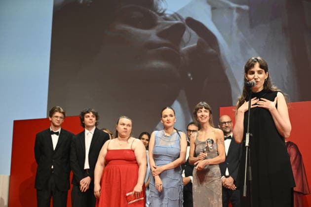 The final day of the 60th Karlovy Vary International Film Festival, on July 11, 2026. Grand Prize of the Proxima competition, the film Lover, Not a Fighter. From left, actors Frantisek Beles and Adam Kubala, producers Erika Paulinska, Julie Markova Zackova and Michaela Kaliska, and director Martina Buchelova. (CTKxPhoto KaterinaxSulova) CTKPhotoP2026071104408  CTKPhotoP2026071104408