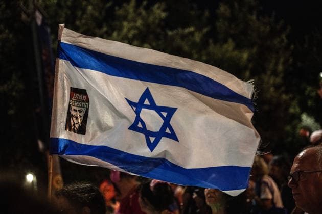 Anti-government demonstrators gather in West Jerusalem JERUSALEM - JULY 11: Protesters hold anti-government placards and wave Israeli flags during a demonstration against Israeli Prime Minister Benjamin Netanyahu and his government in West Jerusalem on July 11, 2026. Demonstrators called for an end to the ongoing military attacks on Gaza and Lebanon. Mostafa Alkharouf Anadolu Jerusalem Israel. Editorial use only. Please get in touch for any other usage.  Copyright: x2026xAnadoluxMostafaxAlkharoufx