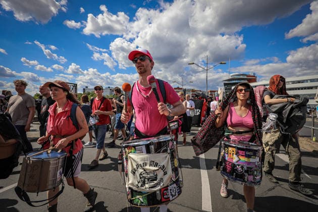 July 11, 2026, Berlin, Berlin, Germany: Demonstrators march and chant during an anti-war protest against Rheinmetall and the arms industry in Berlin, Germany, on July 11, 2026. The demonstration called for an end to weapons production and military expansion, with participants carrying banners and Palestinian flags while demanding greater investment in social services instead of armaments. Berlin Germany - ZUMAa268 20260711_zip_a268_001 Copyright: xAbdelrahmanxAlkahloutx