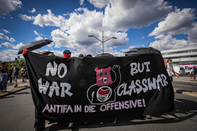 July 11, 2026, Berlin, Berlin, Germany: Demonstrators march and chant during an anti-war protest against Rheinmetall and the arms industry in Berlin, Germany, on July 11, 2026. The demonstration called for an end to weapons production and military expansion, with participants carrying banners and Palestinian flags while demanding greater investment in social services instead of armaments. Berlin Germany - ZUMAa268 20260711_zip_a268_003 Copyright: xAbdelrahmanxAlkahloutx