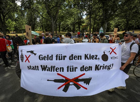 July 11, 2026, Berlin, Berlin, Germany: Demonstrators march and chant during an anti-war protest against Rheinmetall and the arms industry in Berlin, Germany, on July 11, 2026. The demonstration called for an end to weapons production and military expansion, with participants carrying banners and Palestinian flags while demanding greater investment in social services instead of armaments. Berlin Germany - ZUMAa268 20260711_zip_a268_005 Copyright: xAbdelrahmanxAlkahloutx