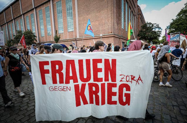 July 11, 2026, Berlin, Berlin, Germany: Demonstrators march and chant during an anti-war protest against Rheinmetall and the arms industry in Berlin, Germany, on July 11, 2026. The demonstration called for an end to weapons production and military expansion, with participants carrying banners and Palestinian flags while demanding greater investment in social services instead of armaments. Berlin Germany - ZUMAa268 20260711_zip_a268_010 Copyright: xAbdelrahmanxAlkahloutx