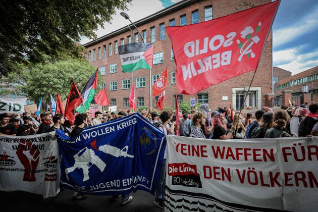 July 11, 2026, Berlin, Berlin, Germany: Demonstrators march and chant during an anti-war protest against Rheinmetall and the arms industry in Berlin, Germany, on July 11, 2026. The demonstration called for an end to weapons production and military expansion, with participants carrying banners and Palestinian flags while demanding greater investment in social services instead of armaments. Berlin Germany - ZUMAa268 20260711_zip_a268_008 Copyright: xAbdelrahmanxAlkahloutx