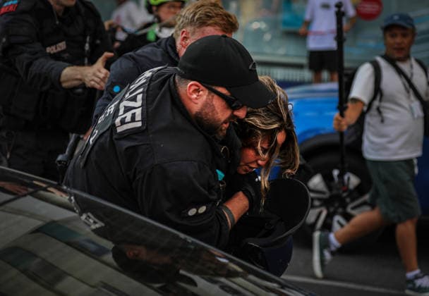 July 11, 2026, Berlin, Berlin, Germany: Berlin police detain several demonstrators during an anti-war protest against Rheinmetall and the German arms industry in Berlin, Germany, on July 11, 2026. Officers moved in to arrest multiple protesters after the demonstration, with several participants being physically restrained during the police operation. Berlin Germany - ZUMAa268 20260711_zip_a268_022 Copyright: xAbdelrahmanxAlkahloutx