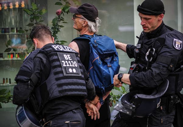 July 11, 2026, Berlin, Berlin, Germany: Berlin police detain several demonstrators during an anti-war protest against Rheinmetall and the German arms industry in Berlin, Germany, on July 11, 2026. Officers moved in to arrest multiple protesters after the demonstration, with several participants being physically restrained during the police operation. Berlin Germany - ZUMAa268 20260711_zip_a268_024 Copyright: xAbdelrahmanxAlkahloutx