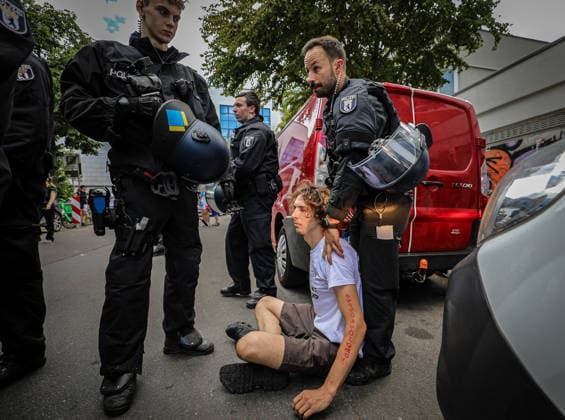 July 11, 2026, Berlin, Berlin, Germany: Berlin police detain several demonstrators during an anti-war protest against Rheinmetall and the German arms industry in Berlin, Germany, on July 11, 2026. Officers moved in to arrest multiple protesters after the demonstration, with several participants being physically restrained during the police operation. Berlin Germany - ZUMAa268 20260711_zip_a268_031 Copyright: xAbdelrahmanxAlkahloutx